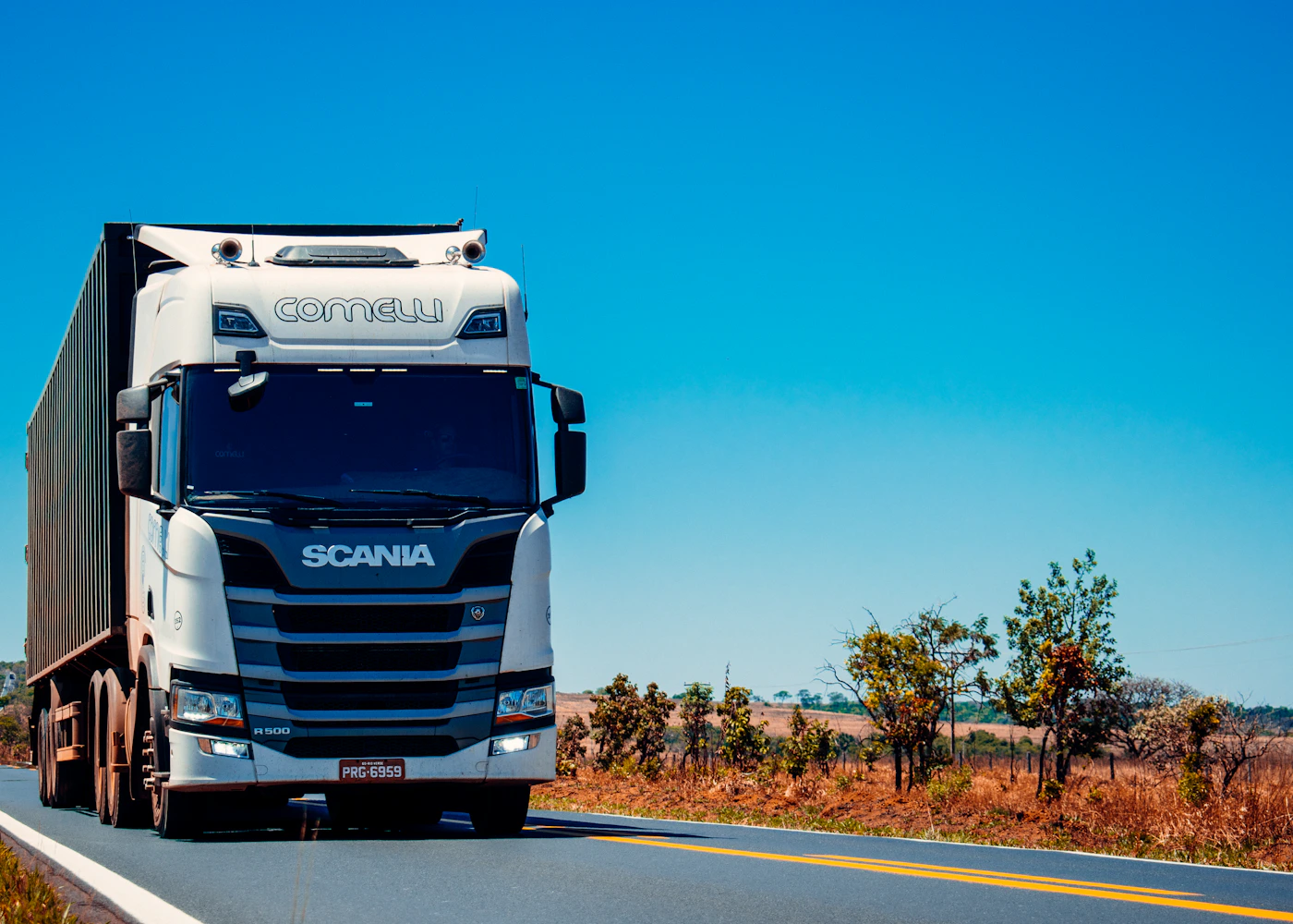 Commercial truck travelling along a road